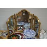 A gilt triptych mirror