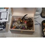 A jewellery box and contents of costume jewellery