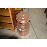A CWS copper 5 gallon milk churn