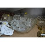 A glass punch bowl set