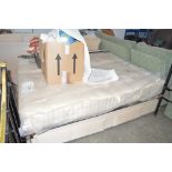 A double divan bed with Herald Supreme mattress