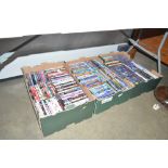 Three boxes of DVDs