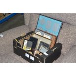 A box containing various photo frames