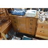 A veneer chest fitted four long drawers