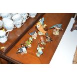 Ten Beswick bird ornaments varying in condition; A