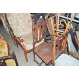 A Victorian style oak chair
