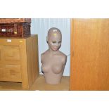 A female mannequin bust