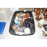 A box of decorative items to include paperweights;