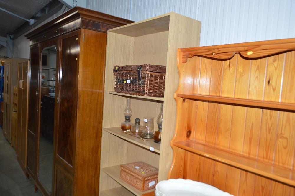 An oak effect, open fronted bookcase