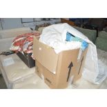 Two boxes of various curtains and poles