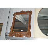 A Rococo style wall mirror