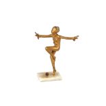 An Art Deco gilded spelter figure of a dancing gir