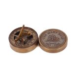 A small brass cased compass