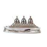 A chrome Art Deco cruet set in the form of an ocea