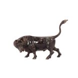 A bronze figure of a bull AF, 14cm long; and a pa