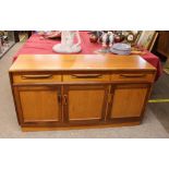 A G-plan design teak sideboard, fitted three drawe