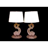 A pair of Baccarat glass table lamps, in the form