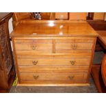 An Edwardian Maple & Co. chest of two short and two long drawer