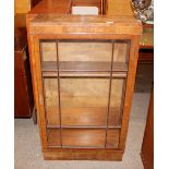 A 1940's burr walnut bookcase, the adjustable shel