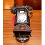 A vintage Bakelite telephone, earpiece AF; and a B