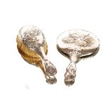 An Edwardian silver backed dressing table hand mir