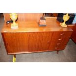 A teak G-plan design sideboard, fitted four short