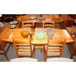 A light wood kitchen dining table, the shaped top