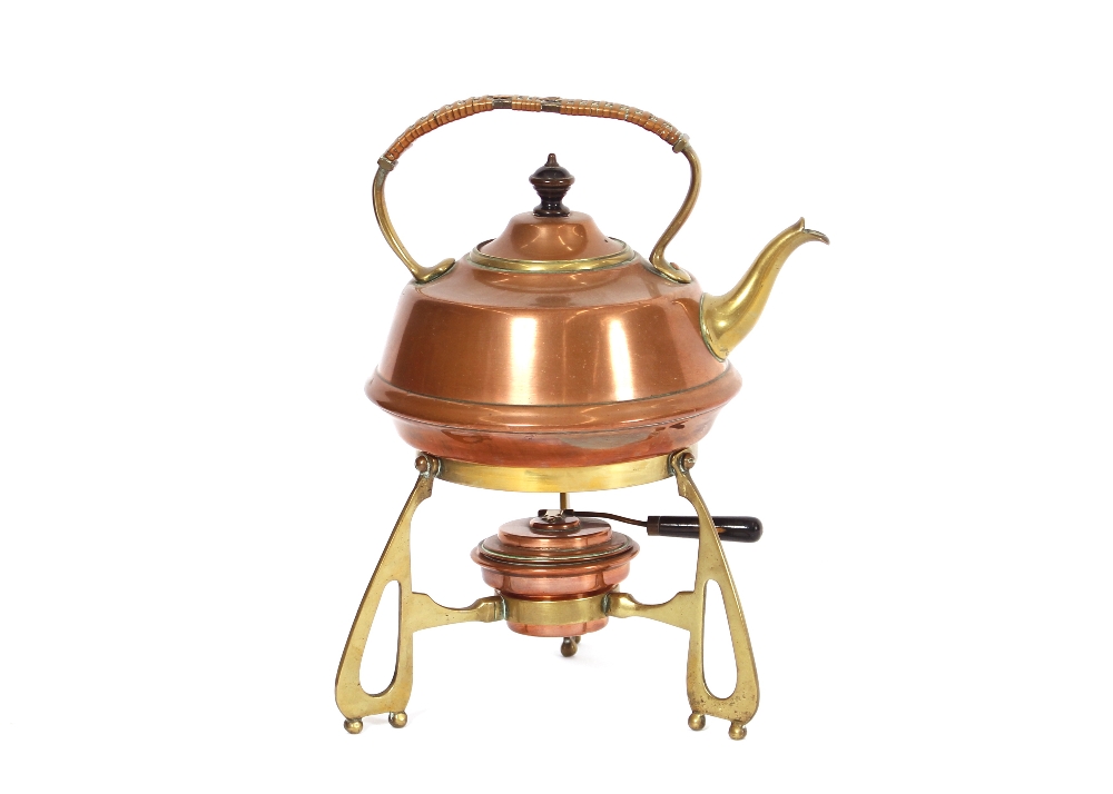 A copper and brass Arts & Crafts design tea kettle