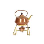 A copper and brass Arts & Crafts design tea kettle