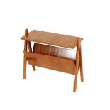 An oak magazine rack / occasional table, raised on