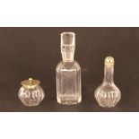 Three 19th Century faceted glass cruet bottled in