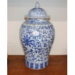 A large Chinese blue and white vase and cover