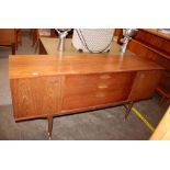 A teak G-plan design sideboard , fitted three cent