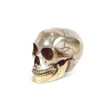 A plated skull ornament