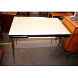 A 1960's Formica and tubular metal draw leaf kitch