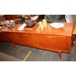 A teak G-plan design sideboard, fitted three centr