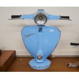 A novelty lamp, in the form of a Vespa motor scoot