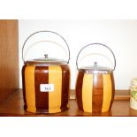 An inlaid wooden biscuit barrel and tea caddy set