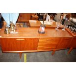 A teak G-plan design sideboard fitted three centra