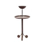 A Bakelite smokers companion stand on wrought meta