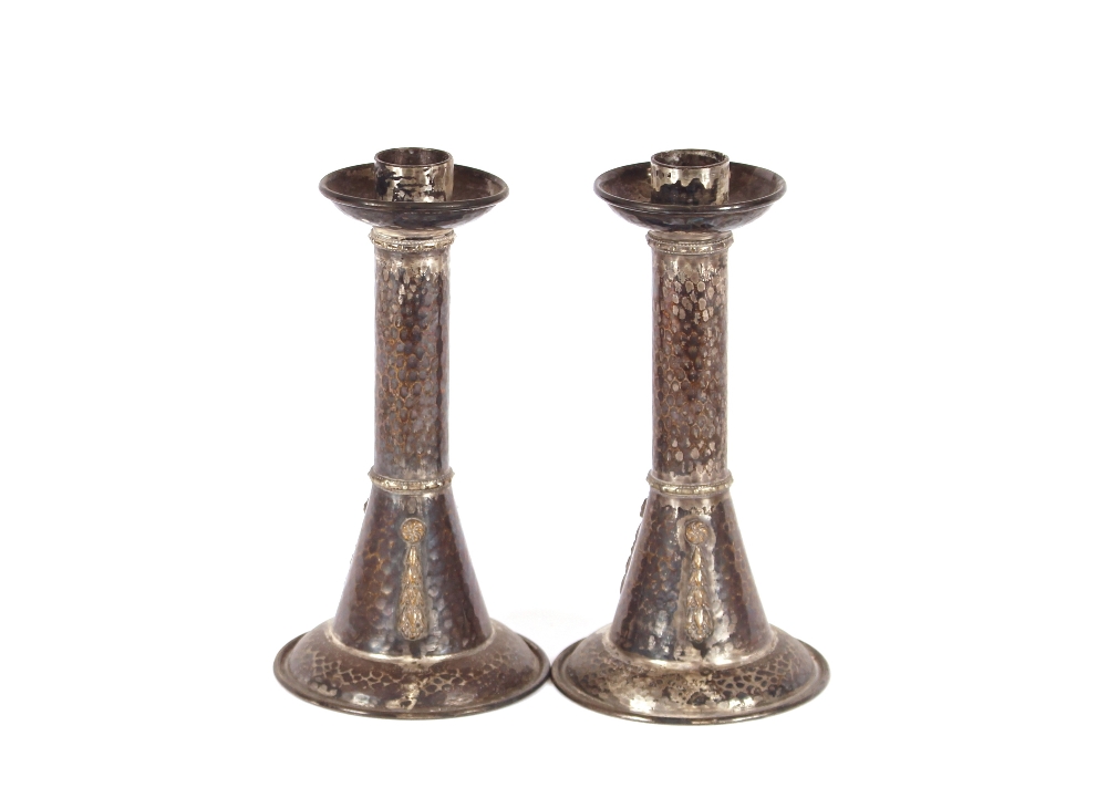 A pair of Arts & Crafts design spot hammered white