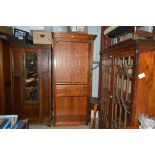 A large hardwood bookcase with adjustable shelves