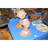 Two hand painted pottery busts