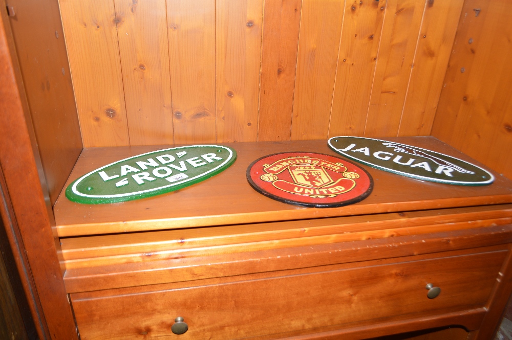 Three various metal advertising signs for Landrove