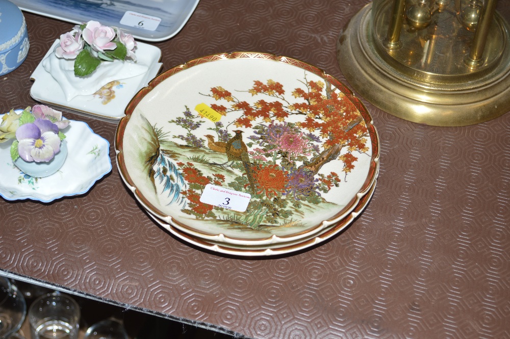 Two Japanese Kutani plates, each decorated with ex