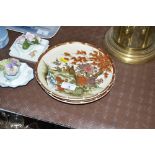 Two Japanese Kutani plates, each decorated with ex