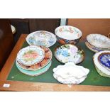 A quantity of hand painted china by Iris Atkinson