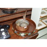 A Victorian copper warming pan; three copper gradu