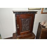 A 19th Century oak cupboard with sectional interio