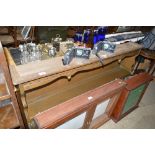 An oak and leaded glazed dresser rack